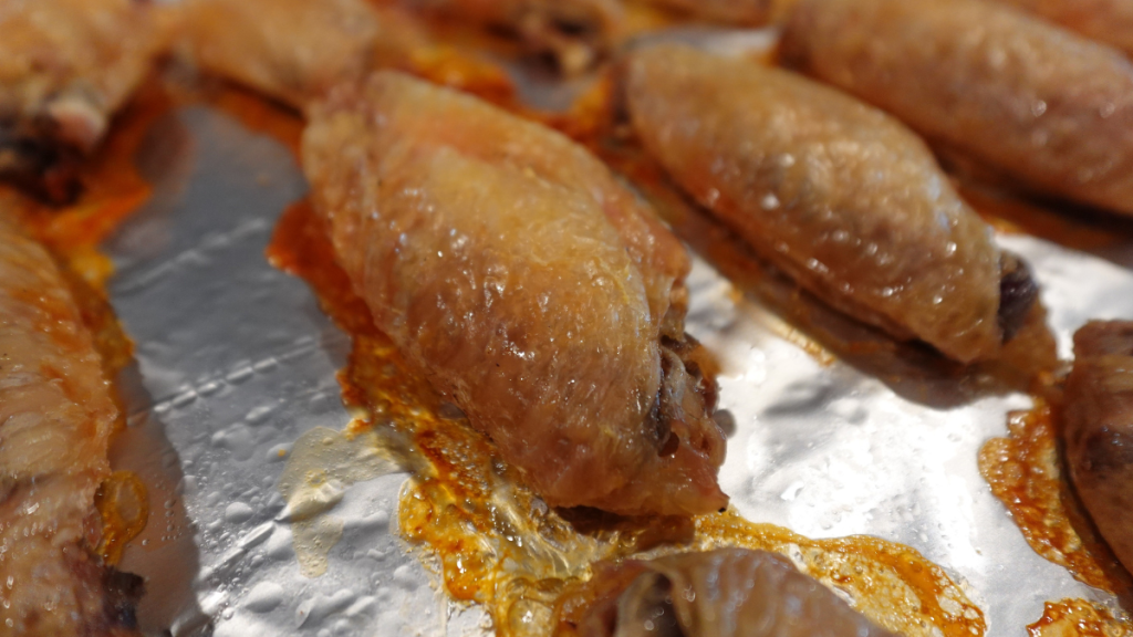 Crispy wings completed to a dark gold color.